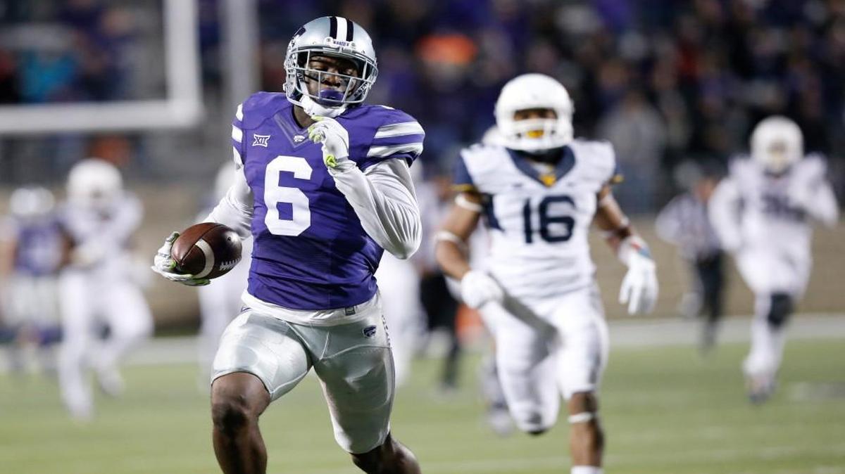 Kansas State wide receiver Deante Burton heads for a touchdown against West Virginia. (December 5, 2015)