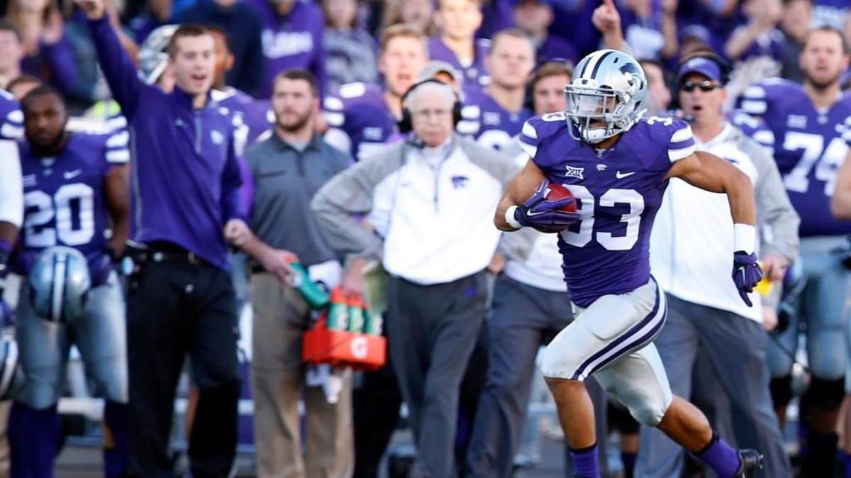 K-State defensive back Morgan Burns returns kick off for 65 yards last November.