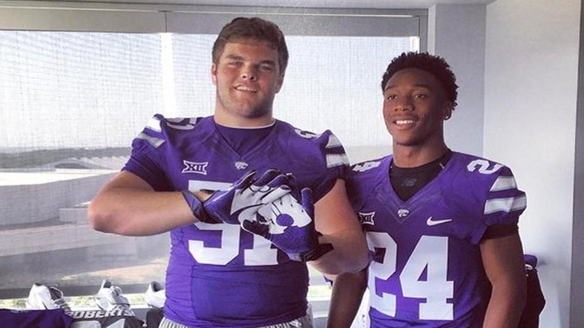 Blake Hickey (left) poses for a photo in K-State gear while on a visit to the school with fellow commit D.J. Render.