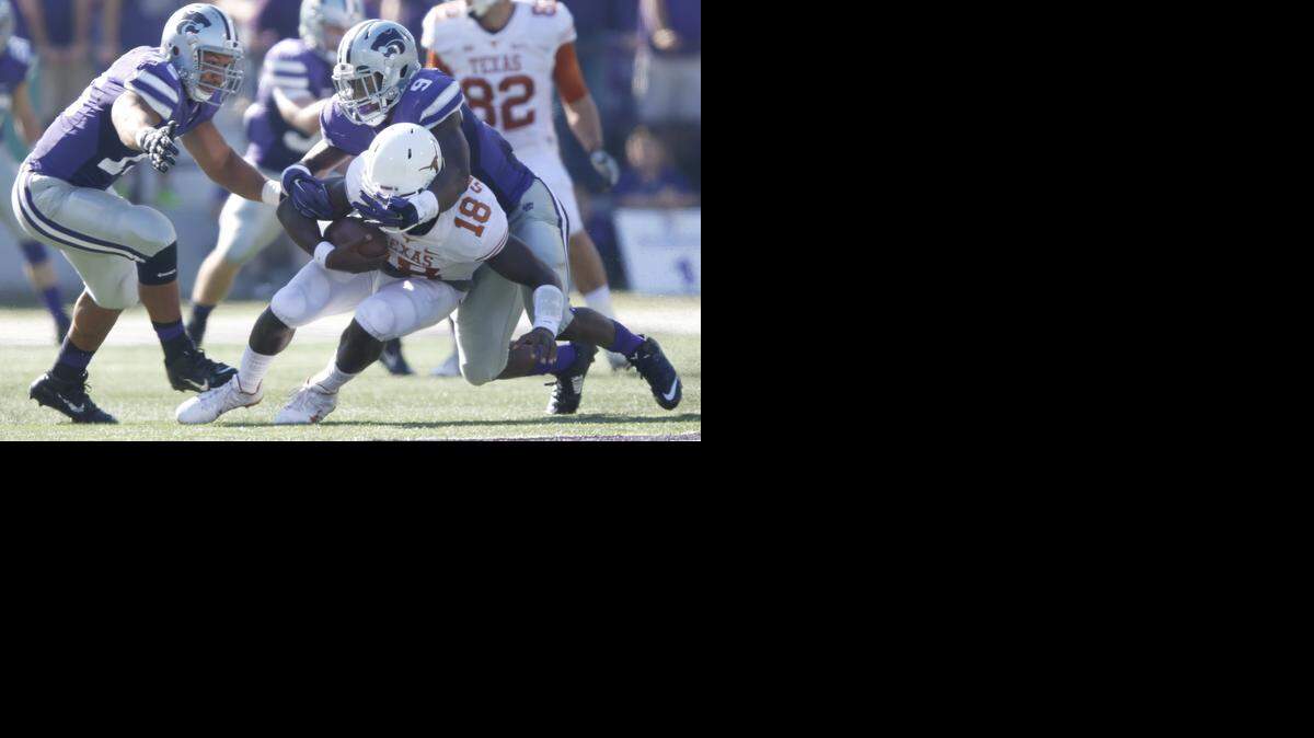 
K-State linebacker Elijah Lee sacks Texas quarterback Tyrone Swoopes in the second quarter Saturday in Manhattan.
