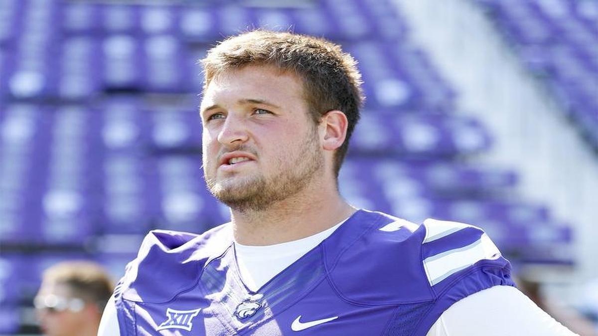 Kansas State center Dalton Risner talks to reporters during media day at the Bill Snyder Family Stadium. (Aug. 8, 2015)
