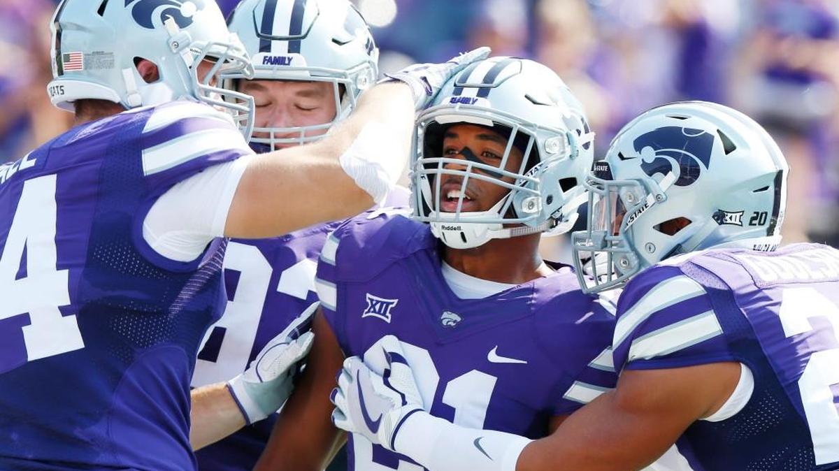 K-State defensive back Kendall Adams celebrates after an interception touchdown against Charlotte. (September 9, 2017)
