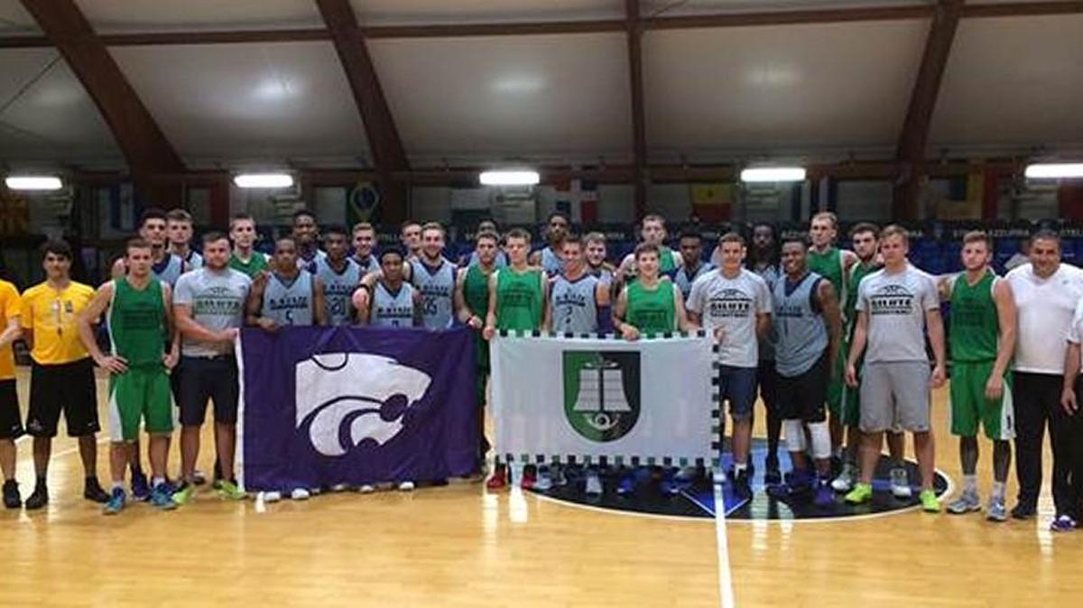 The Kansas State basketball team poses for a picture with BC Silute before an exhibition game Thursday. The Wildcats won 97-80. (Courtesy photo: K-State athletics).