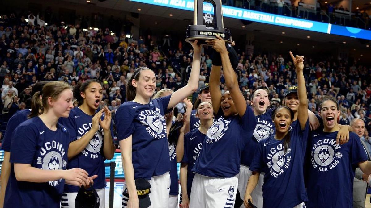 Connecticut women’s basketball players celebrate a regional championship in the 2016 NCAA Tournament, Monday, March 28, 2016, in Bridgeport, Conn. (AP Photo/Jessica Hill)