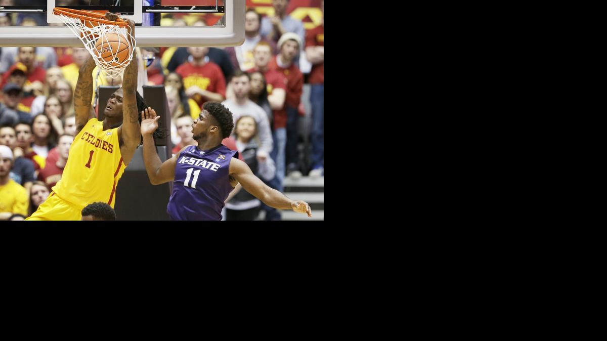 
Iowa State forward Jameel McKay, left, dunks the ball in front of Kansas State forward Nino Williams during the second half Tuesday in Ames, Iowa. 
