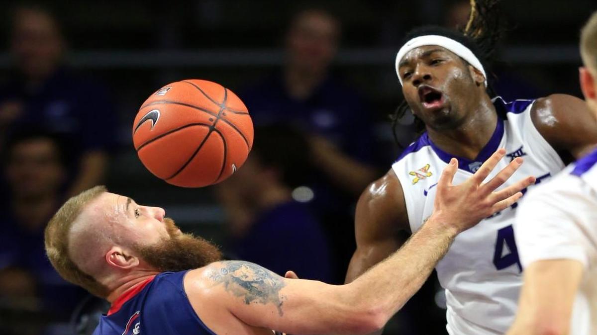 Kansas State forward D.J. Johnson reaches for a rebound last week against Robert Morris.