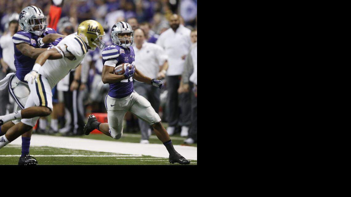 
K-State senior Tyler Lockett makes a long punt return in the second quarter against UCLA on Friday night at the Alamo Bowl. 
