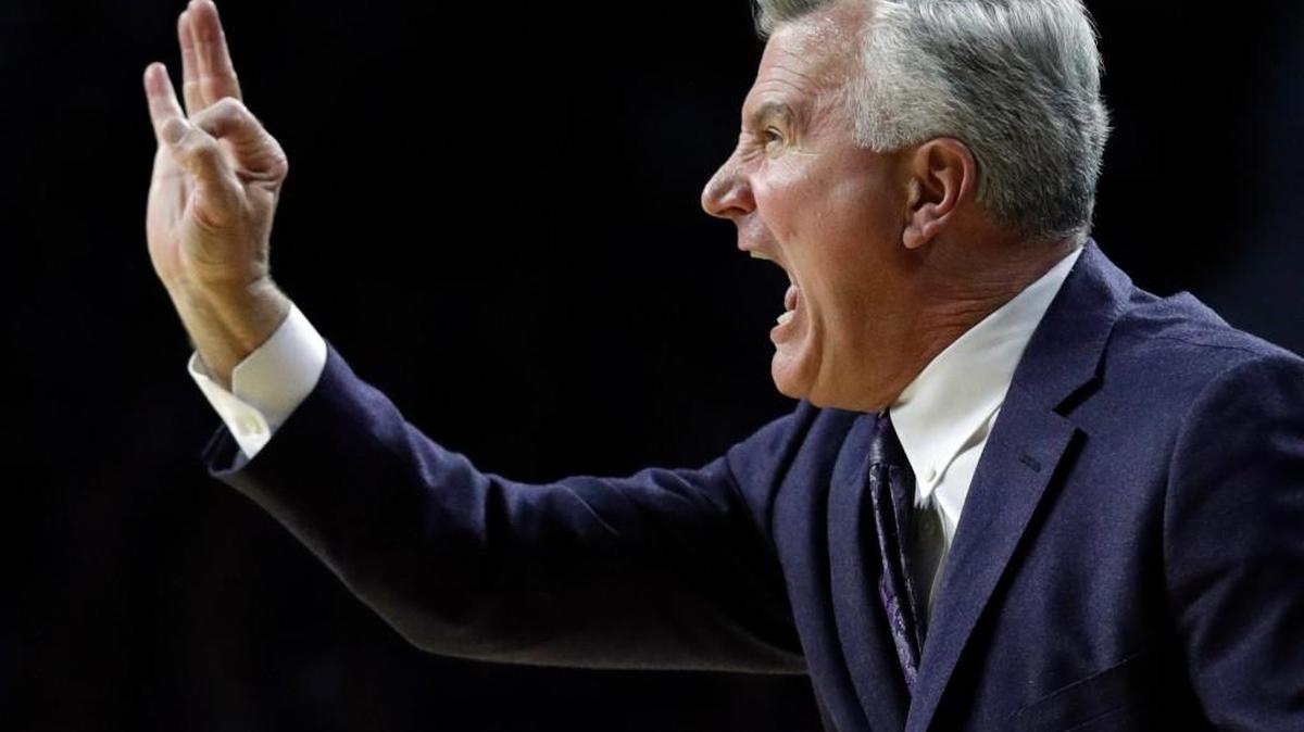 Kansas State coach Bruce Weber signals his team during the first half Monday night in Manhattan.
