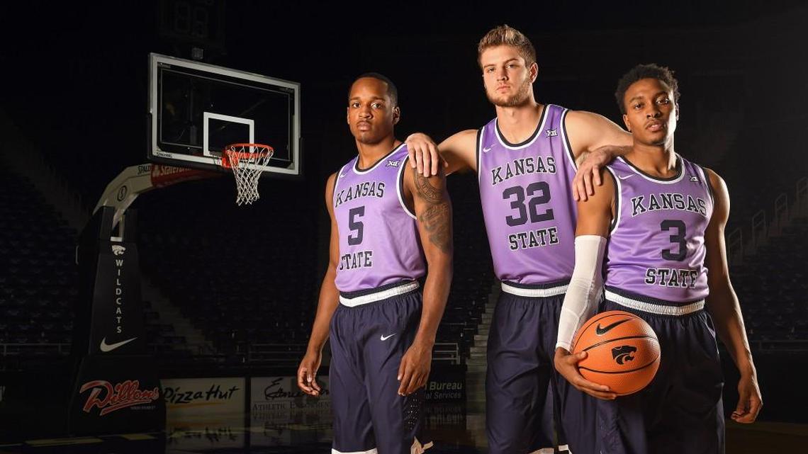 Barry Brown, Dean Wade and Kamau Stokes model K-State’s newest throwback jerseys. Scott Weaver, K-State Athletics.