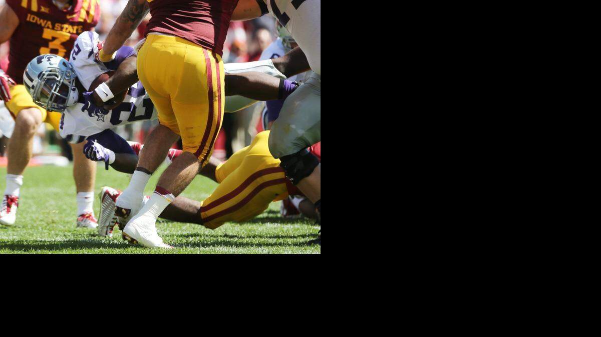 Kansas State running back Charles Jones dives for a touchdown Saturday in Ames, Iowa, during the Wildcats’ 32-28 victory.
