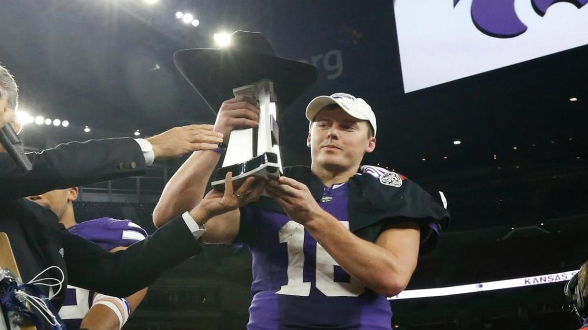K-State quarterback Jesse Ertz is presented the MVP award after K-State defeated Texas A&M in the Texas Bowl.