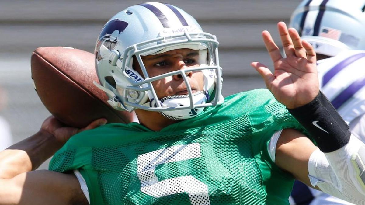 K-State quarterback Alex Delton prepares to fire off a long pass during the 2016 spring game in Manhattan.