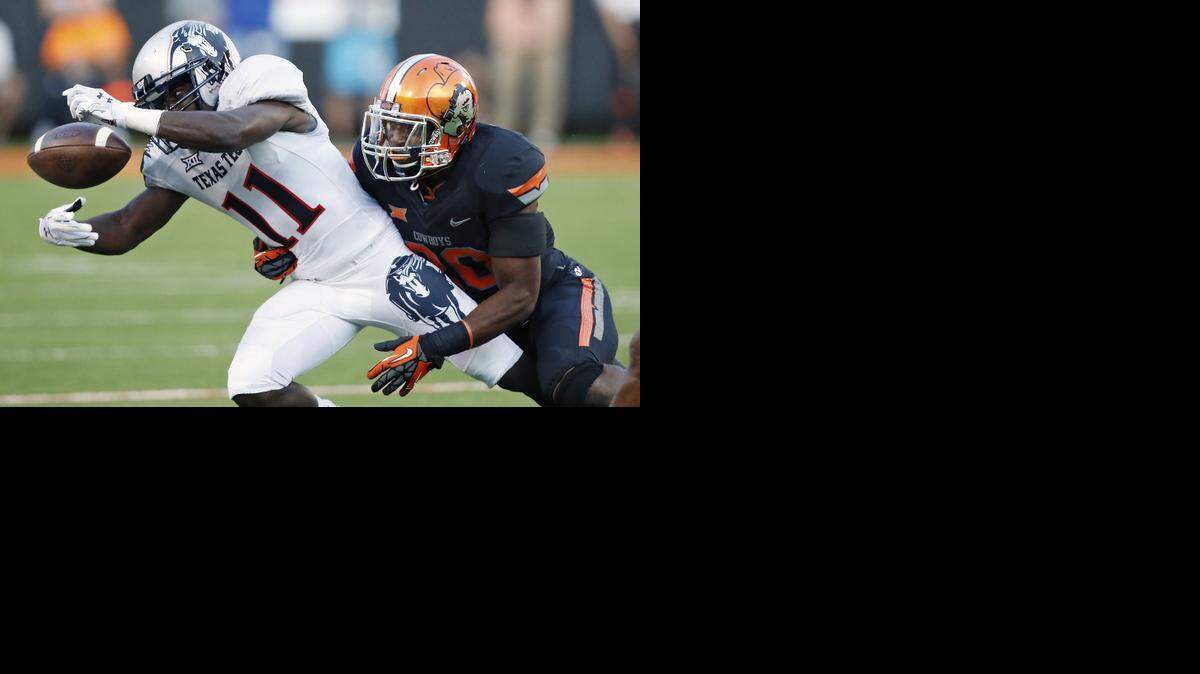
Texas Tech wide receiver Jakeem Grant tries to get his hands on a pass against Oklahoma State. 
