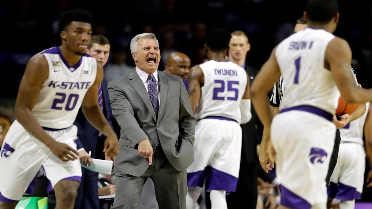 Kansas State coach Bruce Weber talks to his players during a college basketball game against Western Illinois. (AP Photo/Charlie Riedel)