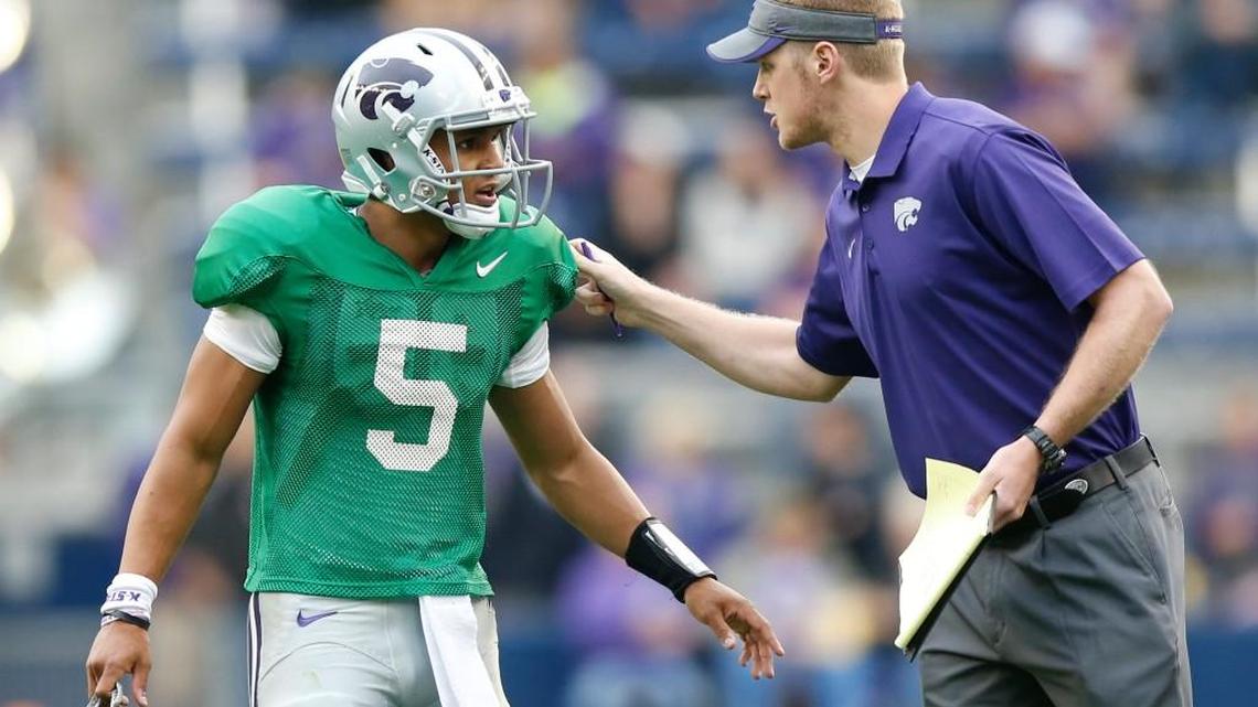 Freshman quarterback Alex Delton gets some words from K-State graduate assistant Collin Klein (April 25, 2015)