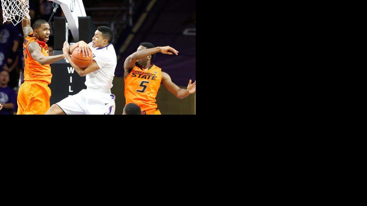 
K-State guard Justin Edwards battles for a rebound against Oklahoma State. (January 24, 2015)
