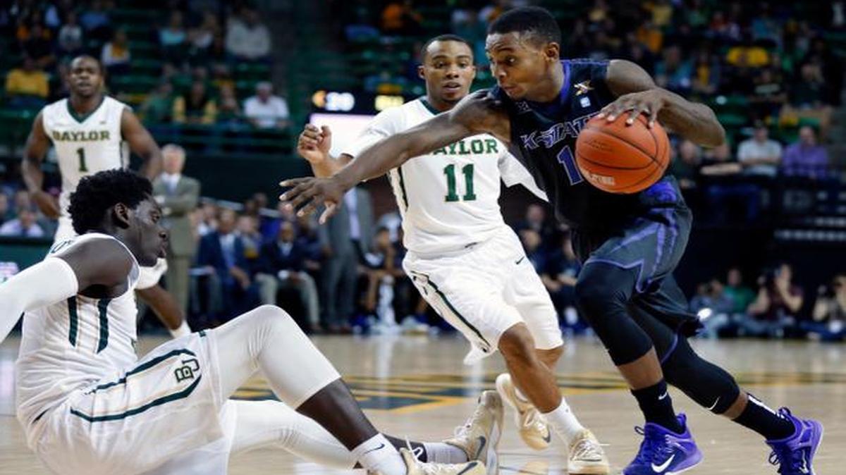 
Kansas State guard Jevon Thomas drives through the Baylor defense in the first half Saturday in Waco, Texas.

