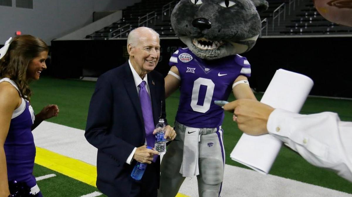 Kansas State football coach Bill Snyder smiles beside team mascot Willie the Wildcat after speaking to reporters during Big 12 media days in Frisco, Texas, Tuesday, July 18, 2017. (AP Photo/LM Otero)
