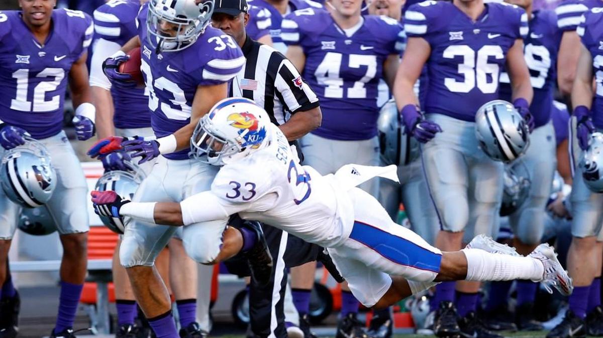 K-State defensive back Morgan Burns runs back a Kansas kickoff for 65 yards during last season’s game in Manhattan.
