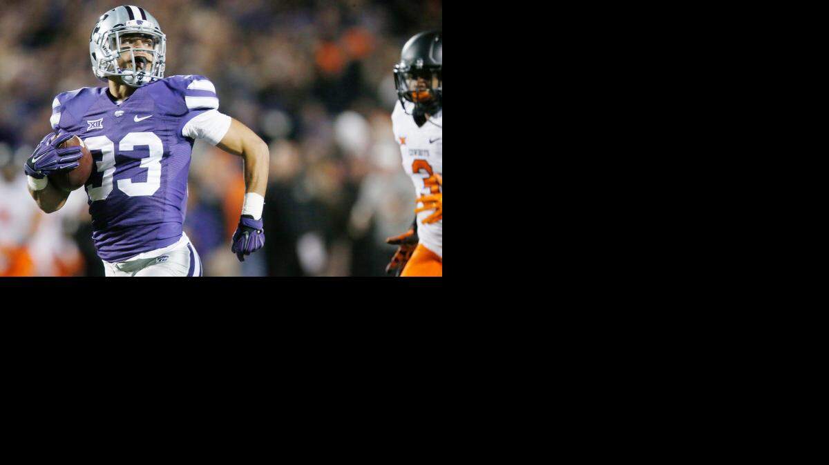 
K-State defensive back Morgan Burns takes off on an 86-yard kickoff return for a touchdown against Oklahoma State.
