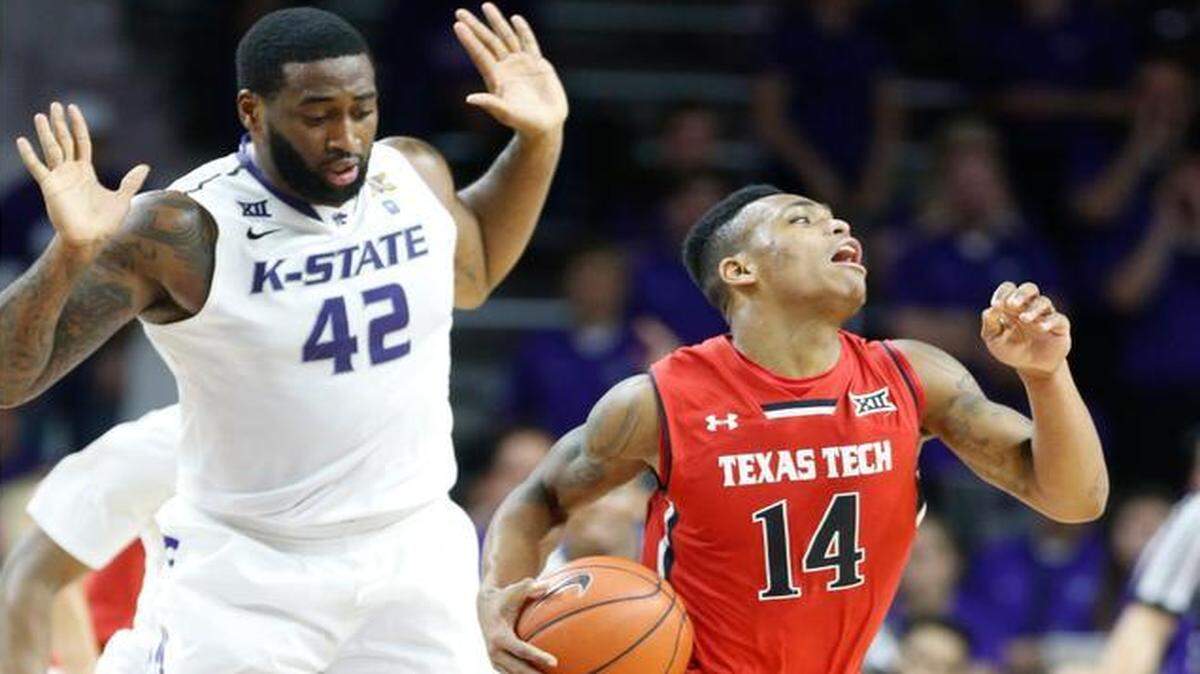 
Texas Tech guard Robert Turner exaggerates his expression as he draws a foul on K-State forward Thomas Gipson during K-State’s seven-point win in January.
