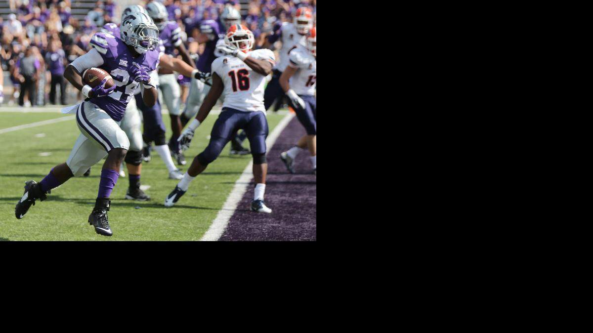 
K-State running back Charles Jones sprints for the end zone as he scores a touchdown against UTEP.(Sept 27, 2014)

