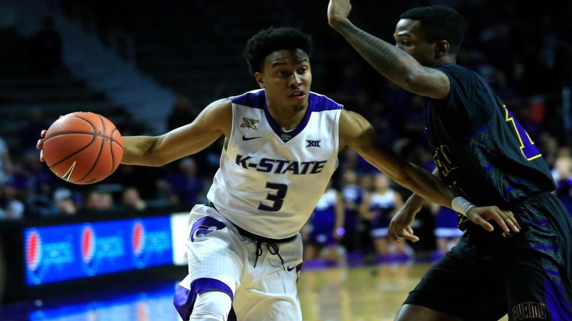 Kansas State guard Kamau Stokes goes against Prairie View A&M guard Ja'Donta Blakley.