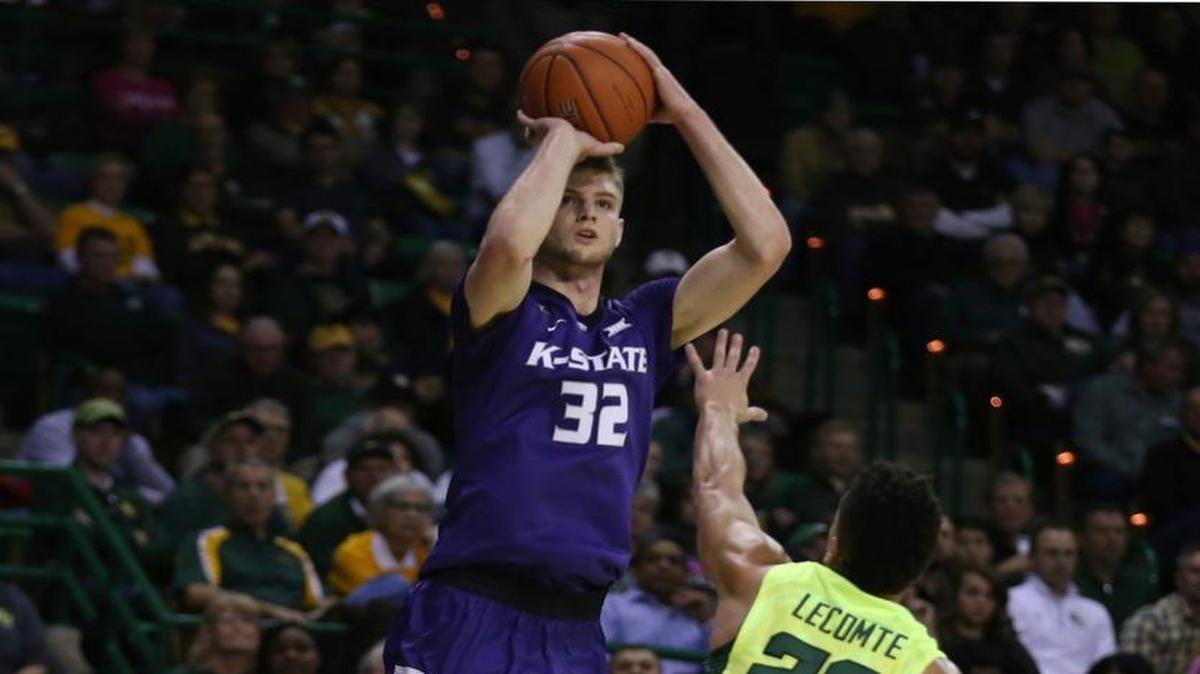 Kansas State’s Dean Wade scores over Baylor’s Manu Lecomte during the first half Saturday in Waco, Texas.