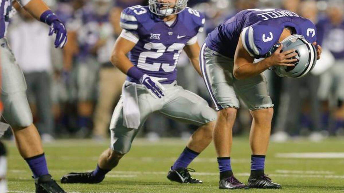 
Kansas State's Jack Cantele grabs his head after a missed field goal during the first half on Thursday night at Snyder Family Stadium in Manhattan.
