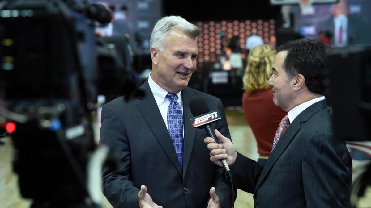 K-State coach Bruce Weber, left, talks with ESPN analyst Fran Fraschilla on Tuesday at the Sprint Center.