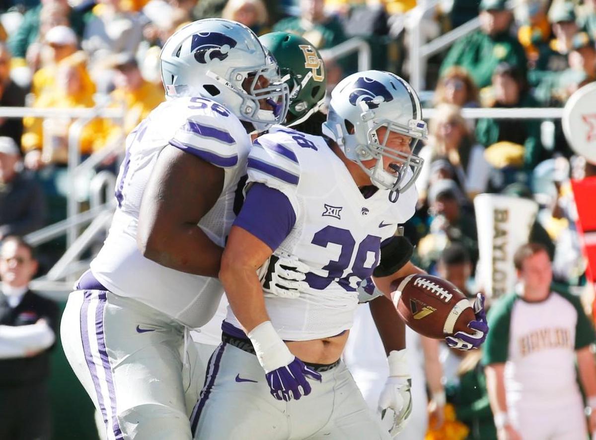 K-State fullback Winston Dimel celebrates a touchdown against Baylor. (November 19, 2016)
