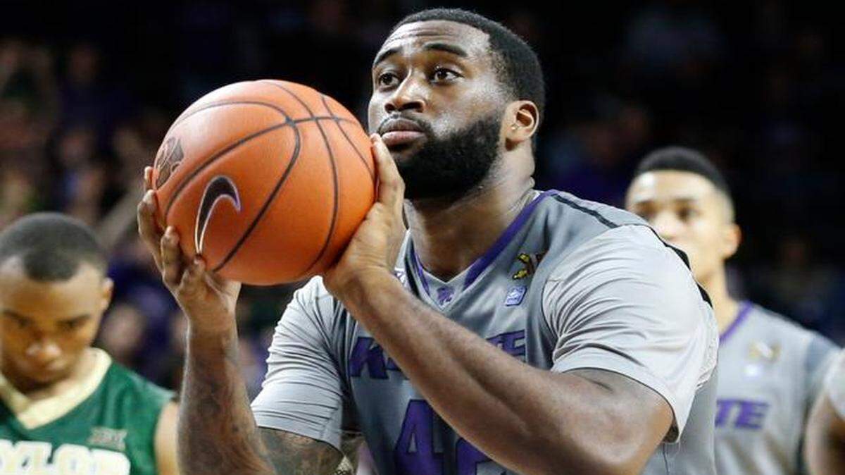 
Thomas Gipson was a steady contributor as a basketball player at Kansas State, but his size has caught the attention of NFL teams. 
