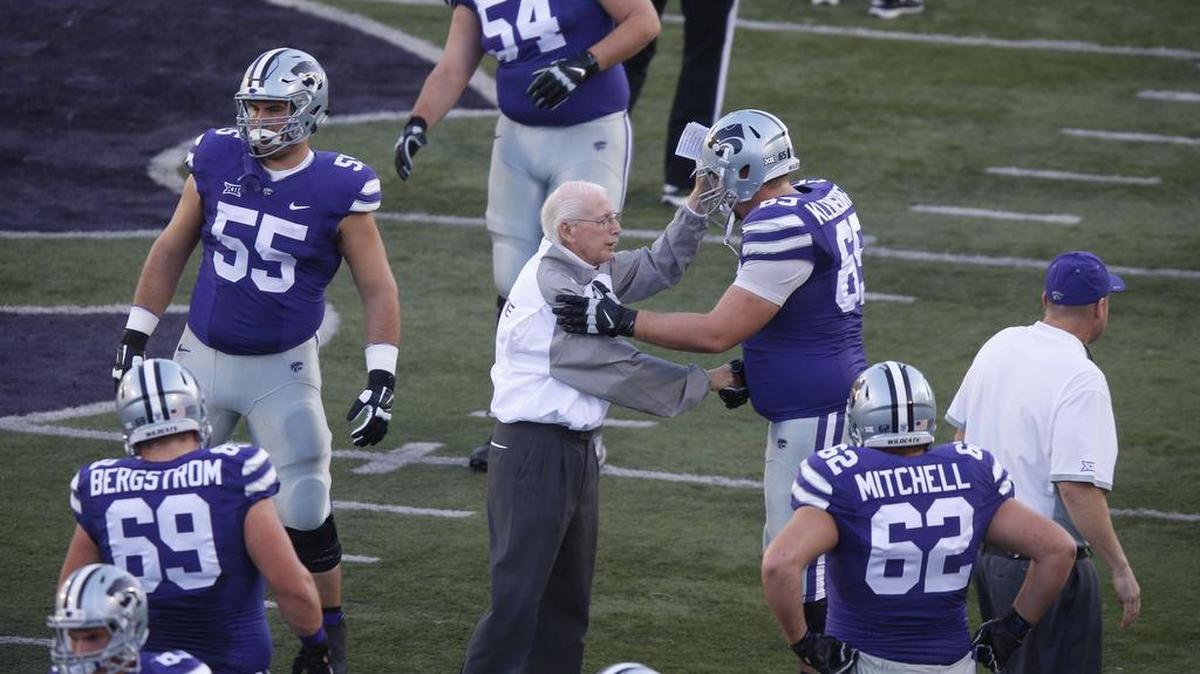 K-State coach Bill Snyder takes time to wish each one of his players well before the start of the game Oct. 10.