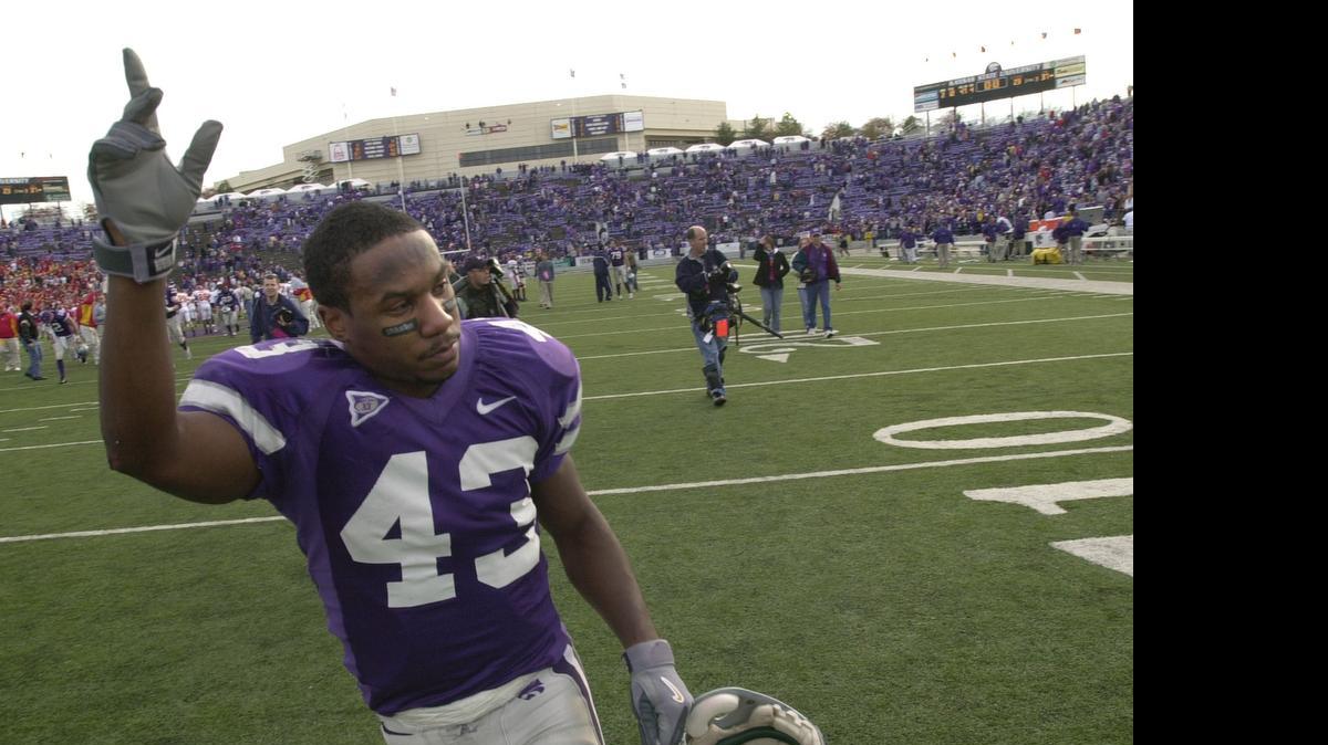 
Kansas State running back Darren Sproles waves farewell to fans as he leaves the field following his final home game in 2004.
