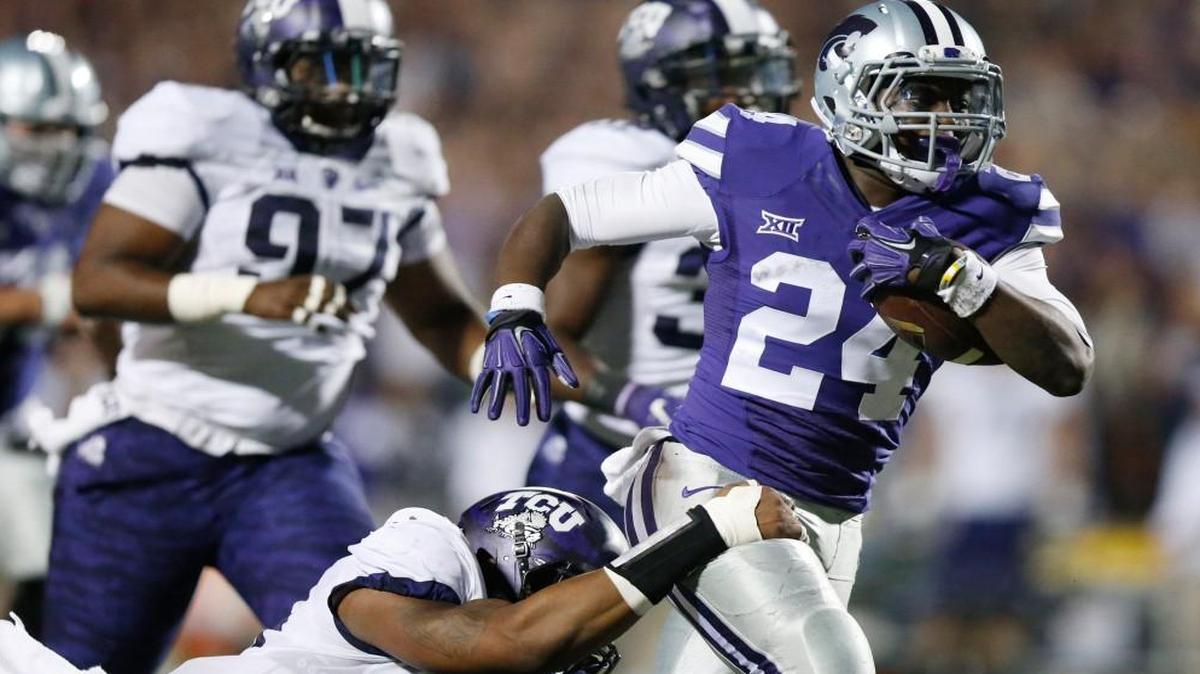 
K-State running back Charles Jones takes off on a touchdown run against TCU in the second quarter. 
