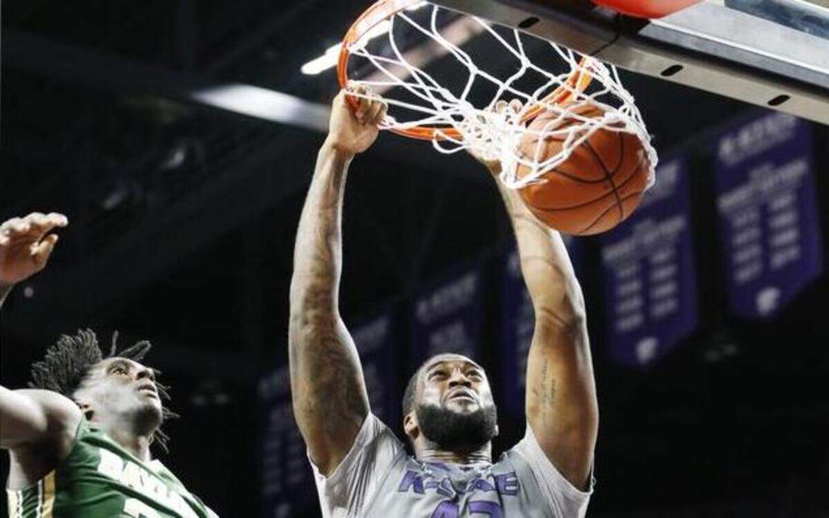 
K-State forward Thomas Gipson slams in a shot against Baylor on Saturday afternoon in Manhattan.
