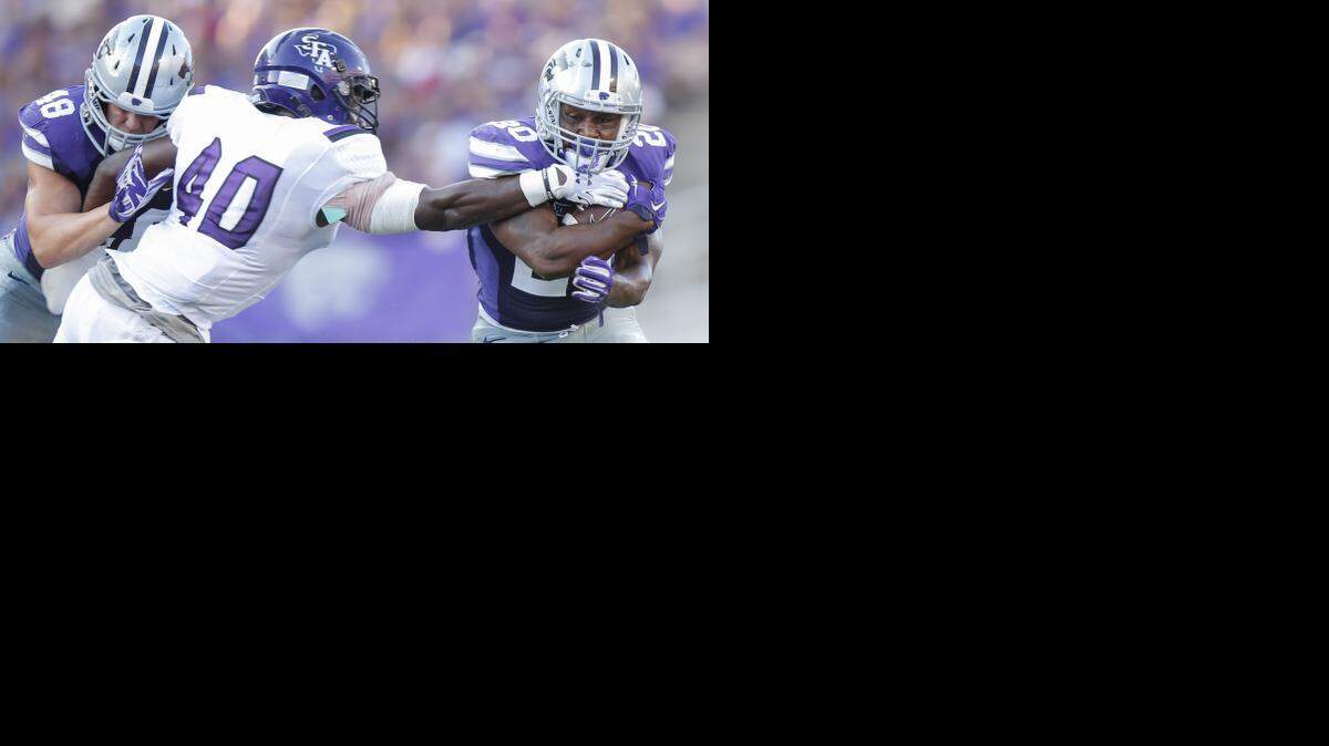
Kansas State's DeMarcus Robinson, right, ran 11 times for 47 yards against Stephen F. Austin.
