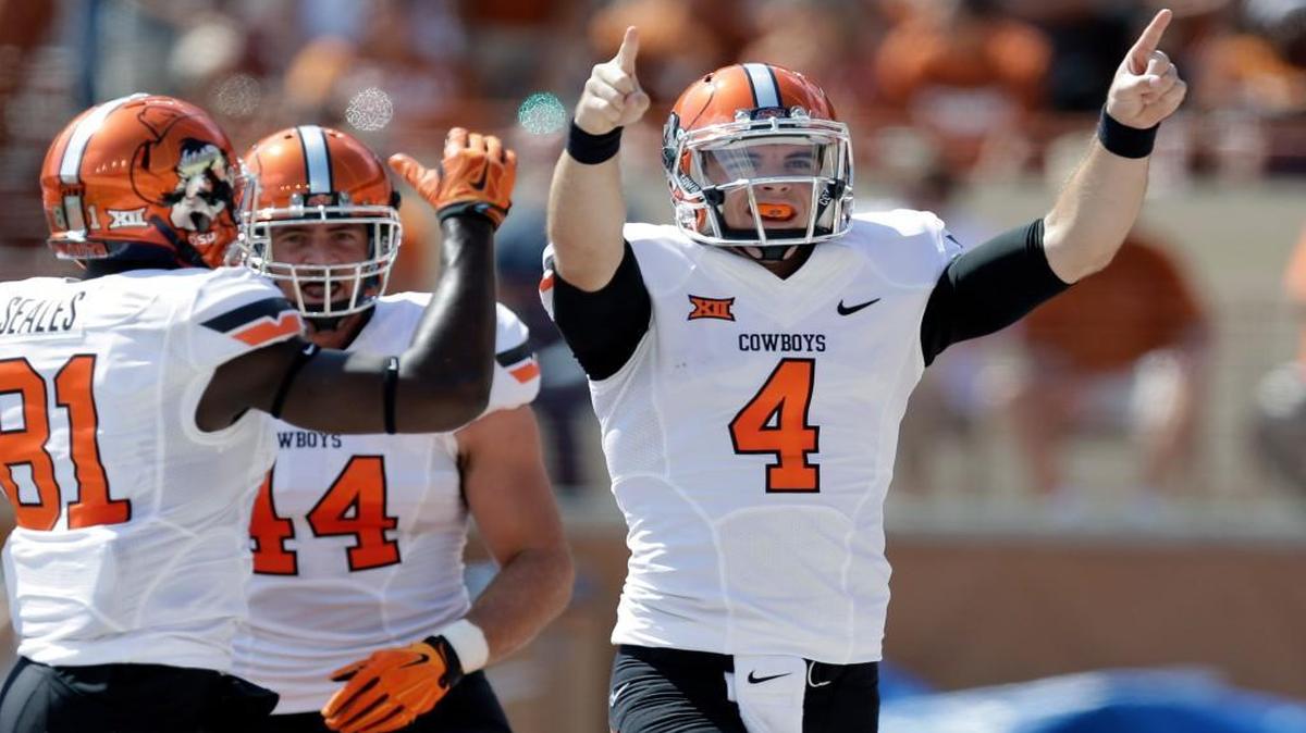 
Oklahoma State backup quarterback J.W. Walsh celebrates a touchdown against Texas.
