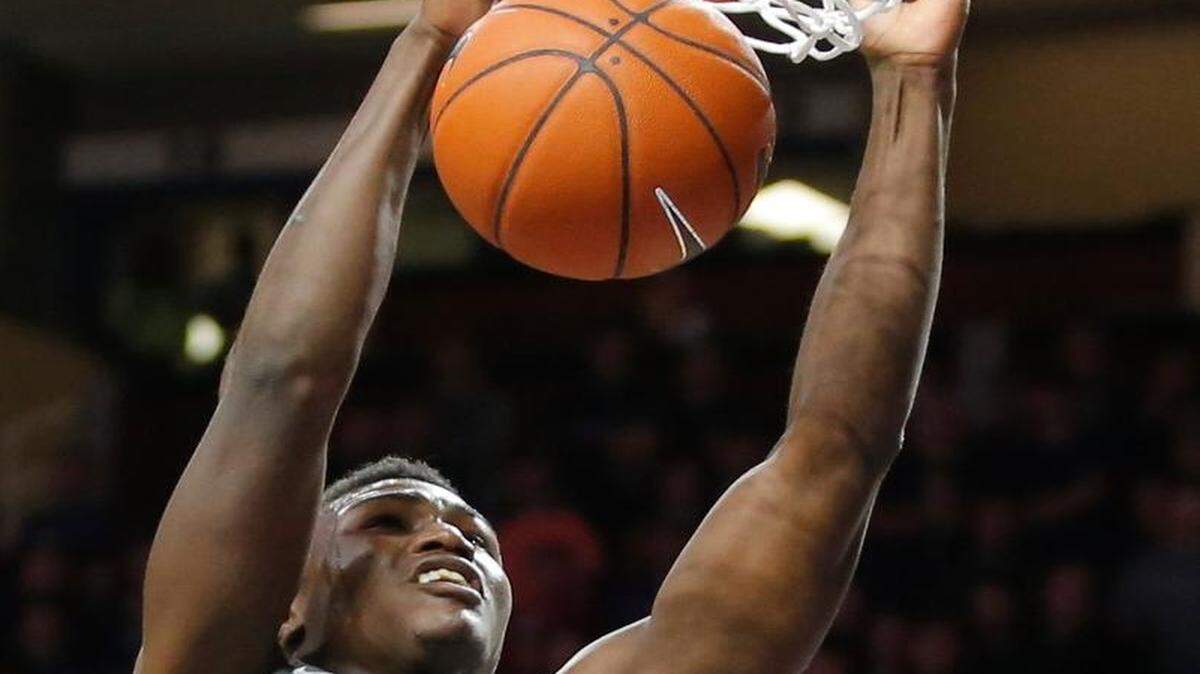 
Kansas State's Malek Harris dunks against Nebraska-Omaha last season.
