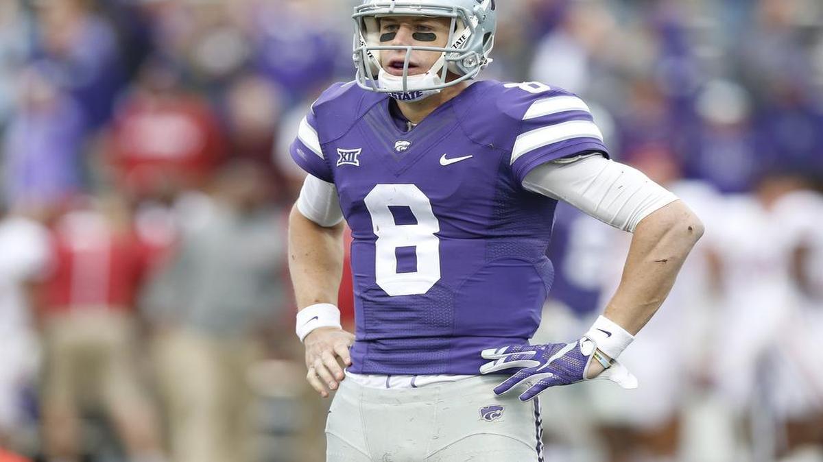 K-State quarterback Joe Hubener (8) started the game for K-State and finished the game, stepping out for K-State wide receiver Kody Cook.