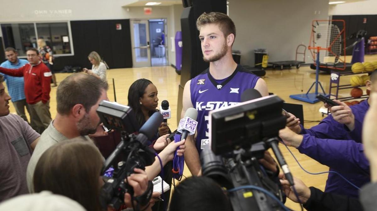 Dean Wade, listening to a question at K-State basketball media day Monday, had a highly successful season as a freshman last year. He's one of the top returning players for Bruce Weber's Wildcats.