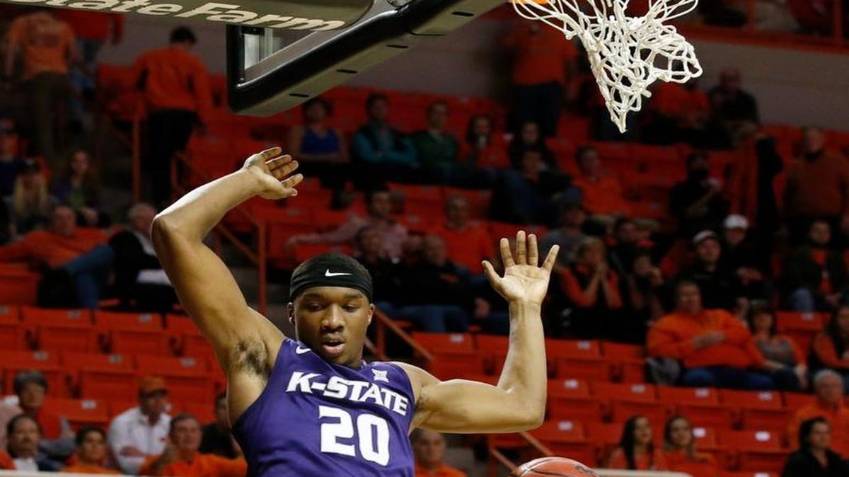 Kansas State forward Xavier Sneed dunks during a victory at Oklahoma State. (AP Photo/Sue Ogrocki)
