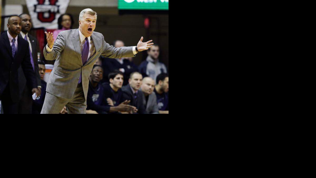 
Kansas State head coach Bruce Weber screams at referees during a game against West Virginia, Wednesday. (AP Photo/Raymond Thompson)
