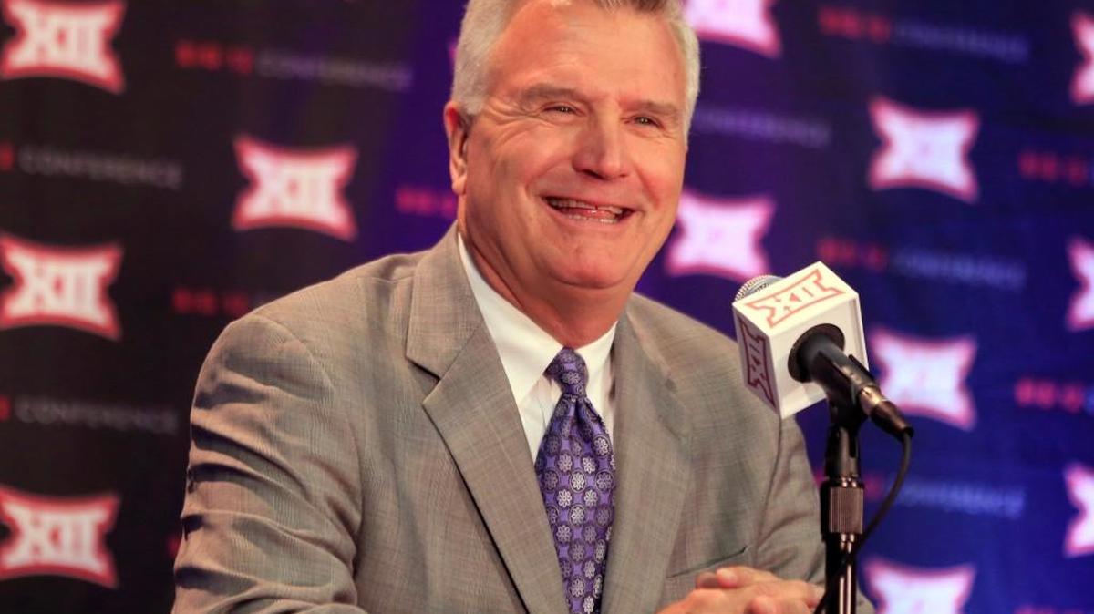 Kansas State coach Bruce Weber smiles at a question during Big 12 NCAA basketball media day in Kansas City. (AP Photo/Orlin Wagner)