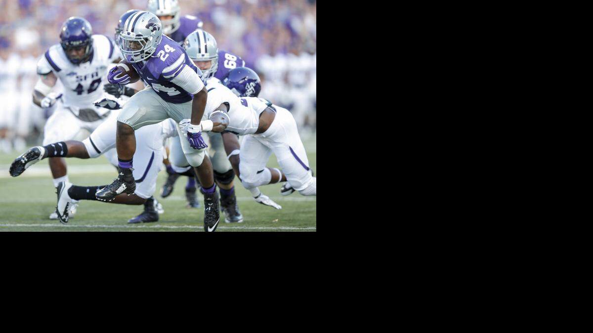 
Kansas State running back Charles Jones runs for a second quarter touchdown against Stephen F. Austin on Saturday at Bill Snyder Family Stadium.
