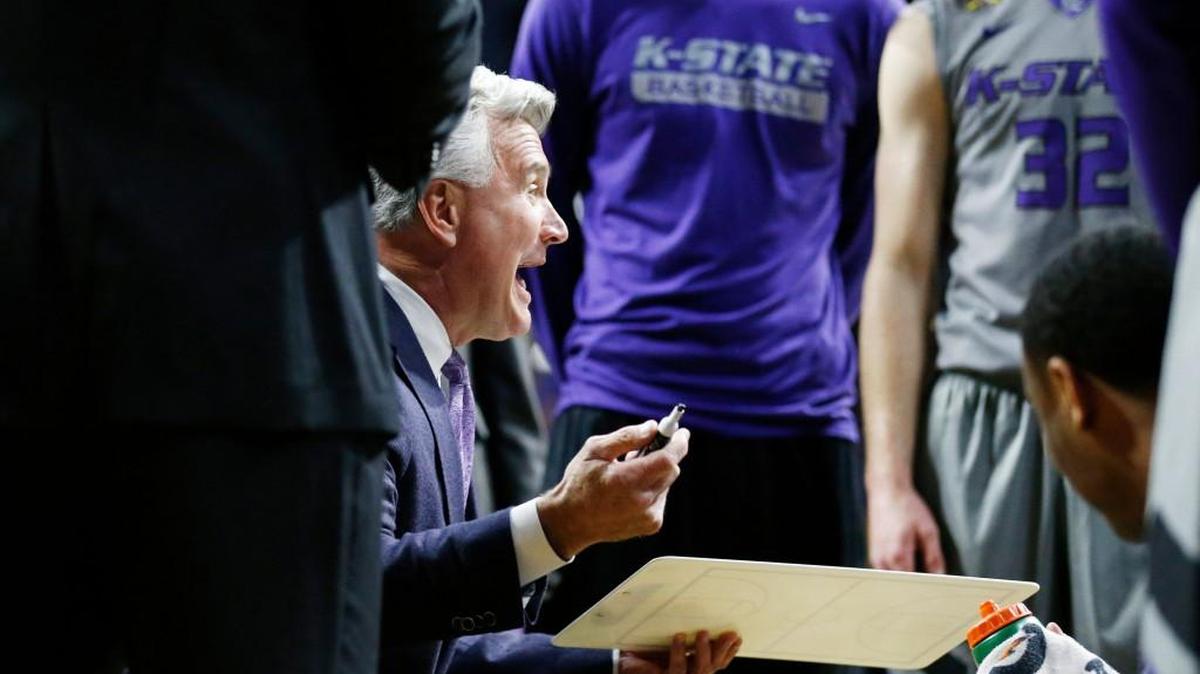 K-State coach Bruce Weber maps out plays during a timeout Saturday as K-State took on Kansas in Bramlage Coliseum.(February 20, 2016)