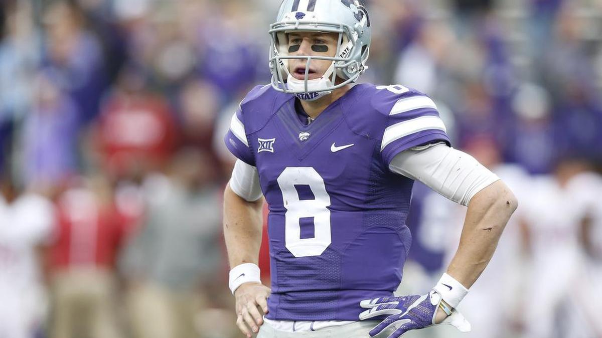 
K-State quarterback Joe Hubener (8) started the game for K-State and finished the game, stepping out for K-State wide receiver Kody Cook (19) who came in mid game. (Oct 17, 2015) 
