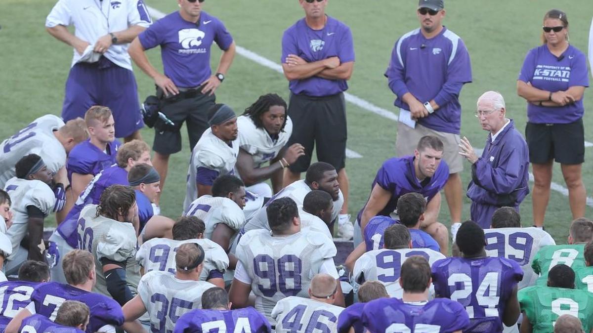 
Kansas State coach Bill Snyder addresses players after practice at Snyder Family Stadium.
