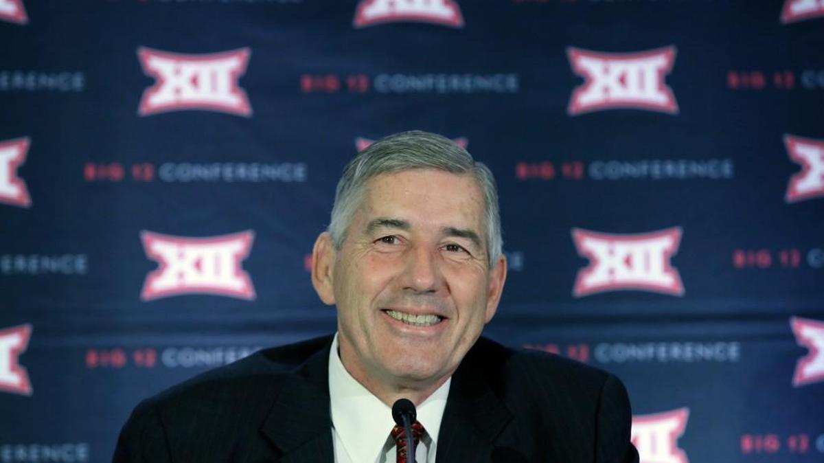 Big 12 commissioner Bob Bowlsby smiles as he speaks to reporters after the first day of the Big 12 sports conference meeting in Irving, Texas, Wednesday, June 1, 2016. (AP Photo/LM Otero)