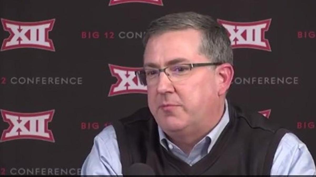 Kansas State president Kirk Schulz addresses media after Big 12 winter meetings in Dallas.